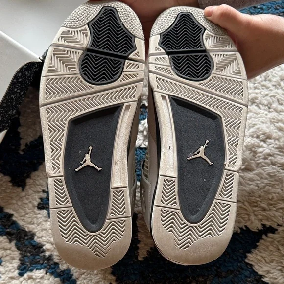 Air Jordan 4 Retro White and Black Sneakers